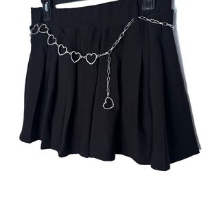 black skirt-shorts with a belt with hearts Size L